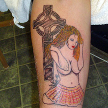 cross tattoos for men on back. tribal cross tattoos for men.