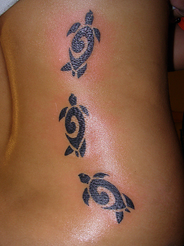cross tattoos - tribal tattoos