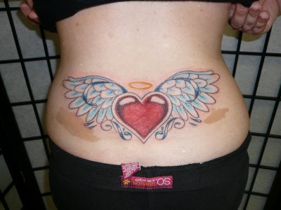 A large tribal angel wings tattoo sample for men and women.