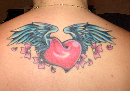 lower back tattoos wings. lower back tattoos hearts