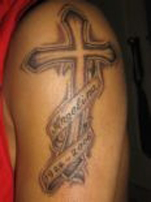 cool cross tattoos for guys. in memory tattoos. tribal